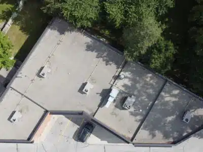 Aeriel view of flat roof replacement for Pizza Pizza franchise.