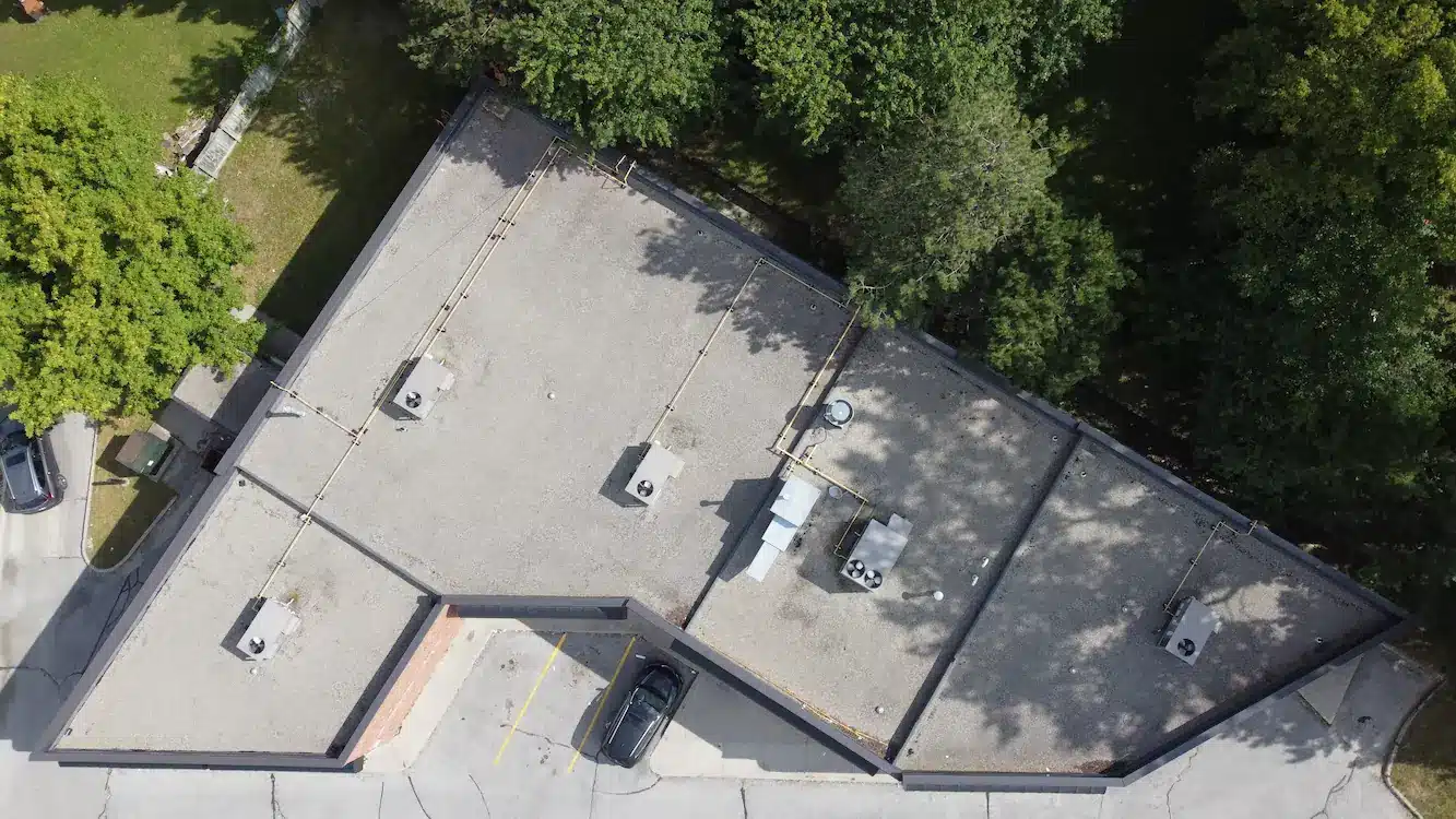 Aeriel view of flat roof replacement for Pizza Pizza franchise.