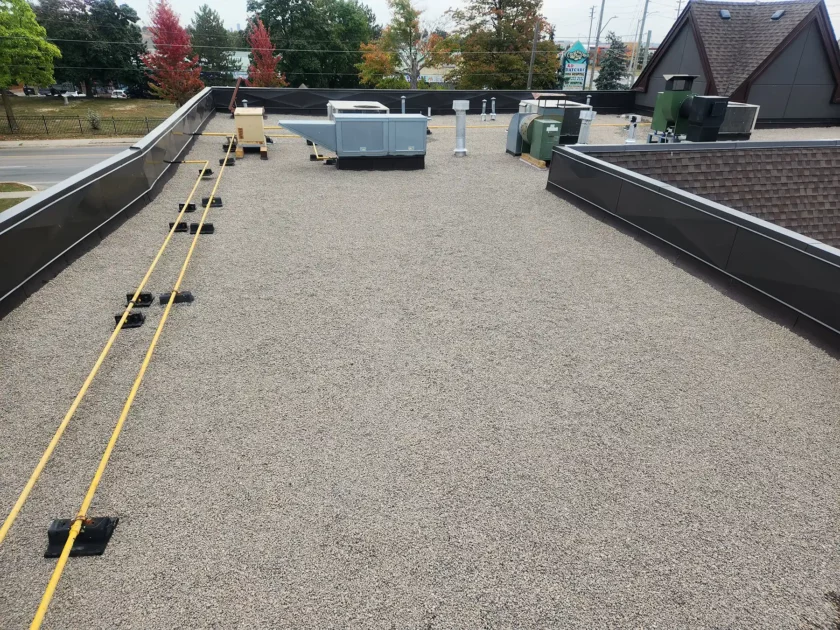 Brampton Flat Roof Replacement: Our experts working on roof enhancements