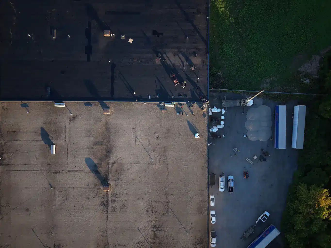 Installation of two-ply base and cap sheets installed over existing insulation in Burlington, Ontario