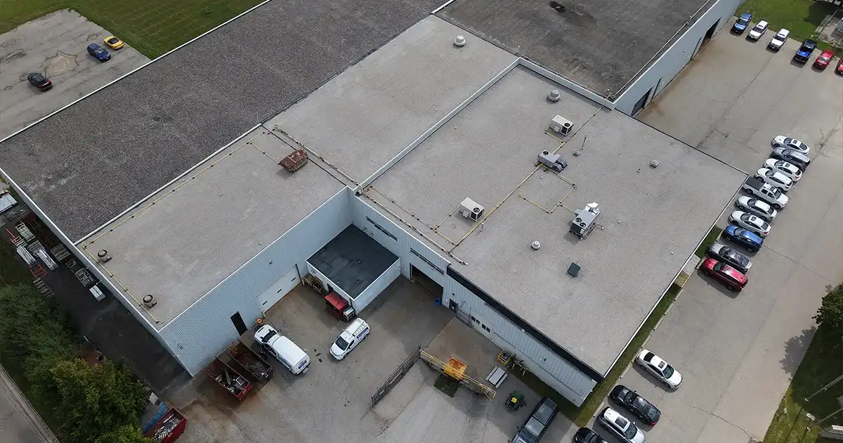 Replacing Leaky Flat Roof for Industrial Property in Elmira