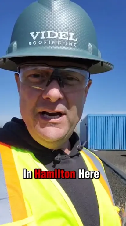 Kirby Hewines completing a 550ft expansion joint replacement on a commercial roof in Hamilton, Ontario