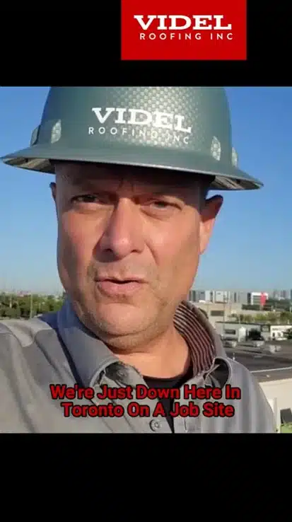 Kirby Hewines inspecting a commercial roof membrane split in Toronto caused by a neglected wind-swept corner that escalated into soaked insulation and major repair