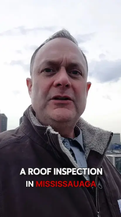 Videl Roofing inspecting a commercial flat roof in Mississauga with multiple patch repairs and water-soaked insulation caused by deferred maintenance